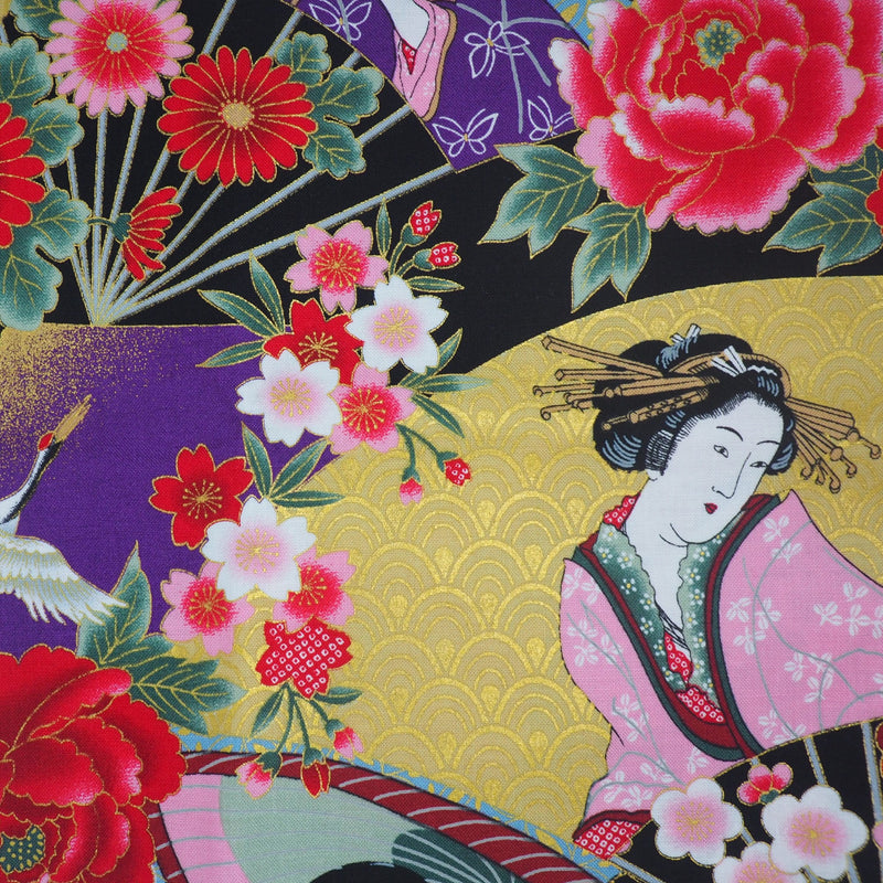 Close-up shot of vibrant multi-coloured geisha print Japanese cotton fabric with gold detailing.
